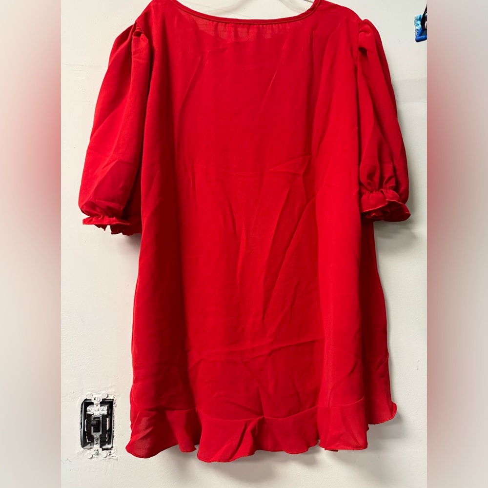 Women’s high low ruffled top